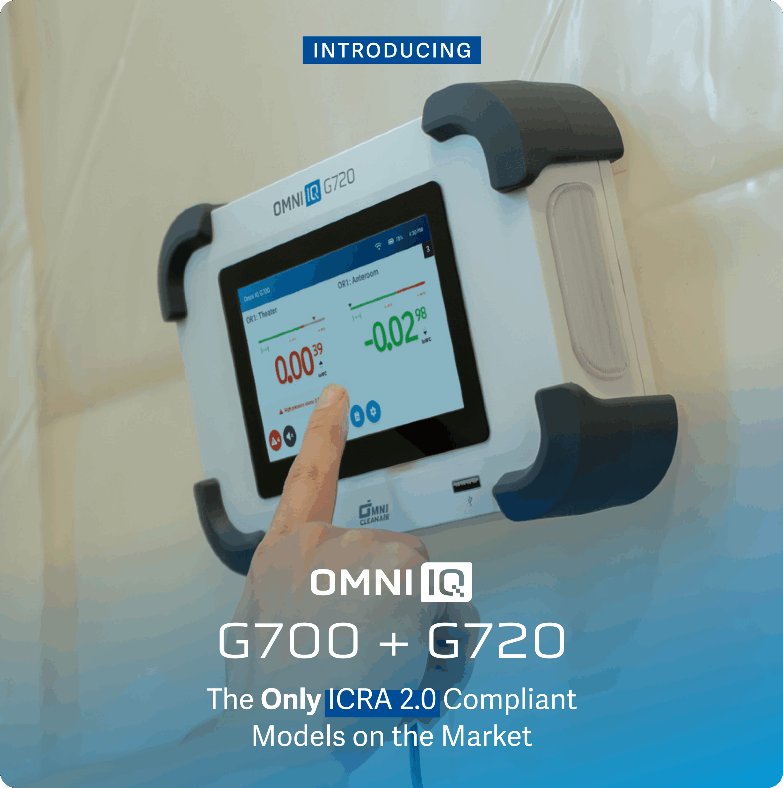 finger touching screen of Omni IQ G720 differential pressure monitor